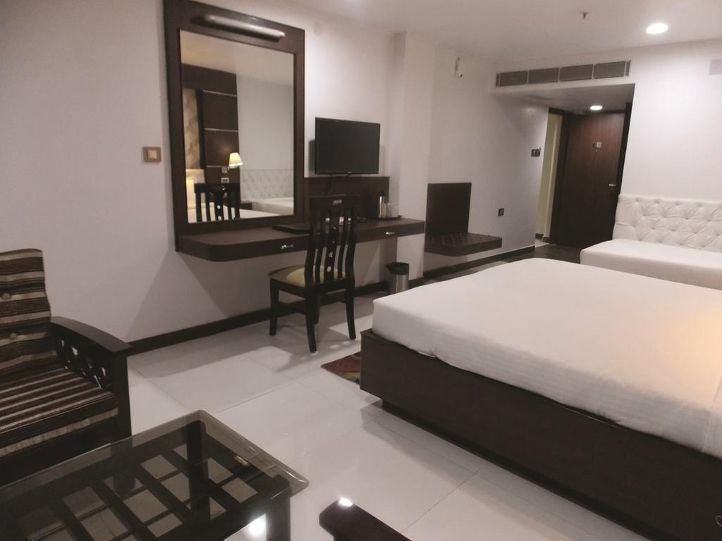 Airport City Hotel Калькутта Номер фото