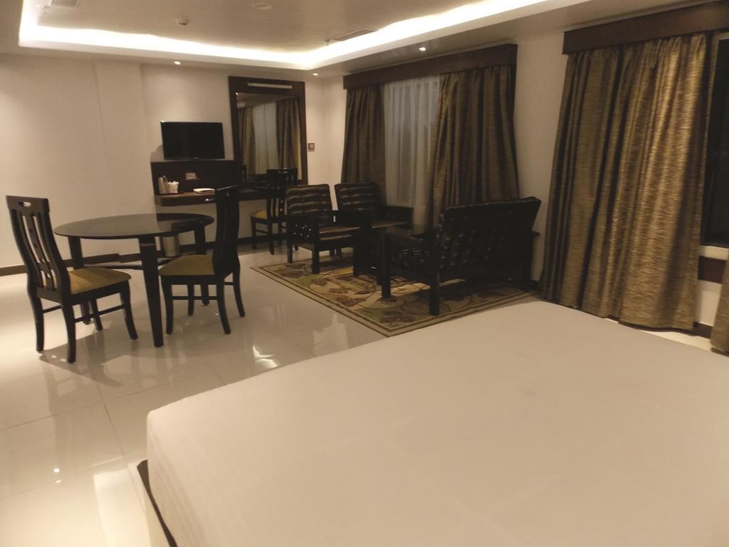 Airport City Hotel Калькутта Номер фото