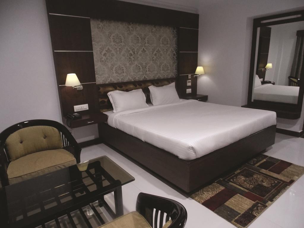Airport City Hotel Калькутта Номер фото