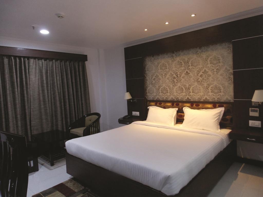 Airport City Hotel Калькутта Номер фото