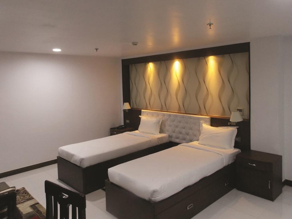 Airport City Hotel Калькутта Номер фото